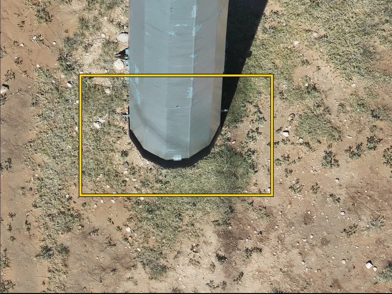 Steel pole base with ground-line area boxed